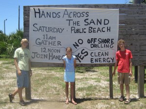 Leo, Julita, and Edward invited people to Hands Across the Sand