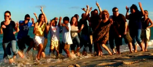 People dancing on the beach